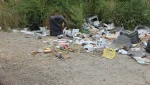 Свалка возле карьера подступает к Гаю